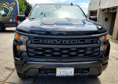 some time on a multi-step paint correction, so much so that we nick named it “The Devils Truck.” Once we got past the layers of swirls and scratches, we fine polished it to a slick surface, so that the dust would just blow off at freeway speeds. Finally, we coated it with our 5-year ceramic coating. We also added our promotional ceramic glass coating for free (normally a $150.00 Value).