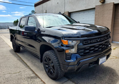 some time on a multi-step paint correction, so much so that we nick named it “The Devils Truck.” Once we got past the layers of swirls and scratches, we fine polished it to a slick surface, so that the dust would just blow off at freeway speeds. Finally, we coated it with our 5-year ceramic coating. We also added our promotional ceramic glass coating for free (normally a $150.00 Value).